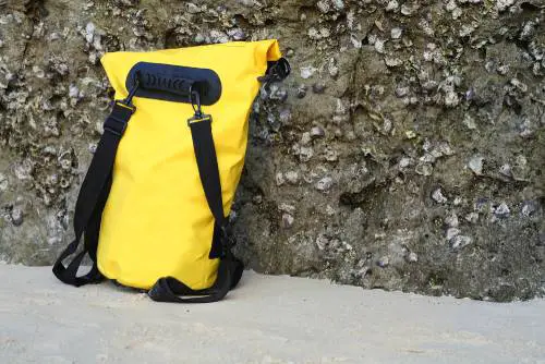 yellow waterproof roll-top backpack